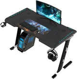 Ekkio RGB Light Gaming Desk Z Shaped with Cup Holder Headphone Holder, Ergonomic, Workstation Computer Desk Carbon Fibre Textured, Stable Structured Frame, Anti-Slip Foot Pad (Black, 100 * 60 * 73cm)