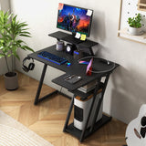 L-Shaped Gaming Desk with Outlets & USB Ports, Small Computer Desk with Monitor Shelf, Headphone Hook, Storage Shelf & Host Stand, Corner Gamer Desk with Carbon Fiber Texture