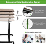 Mobile Height Adjustable Standing Desk, Compact Pneumatic Sit to Stand Up Computer Desk w/ Lockable Wheels, Ergonomic Rolling Laptop Table w/ Steel Frame for Home Office (Brown)